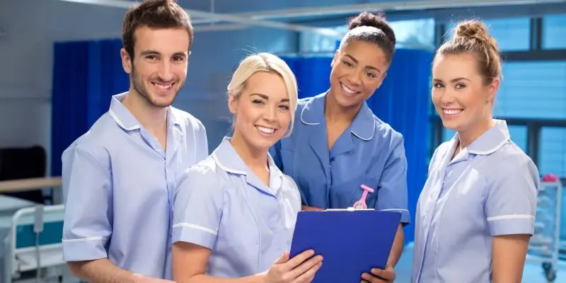 Four Nurses Looking At The Camera