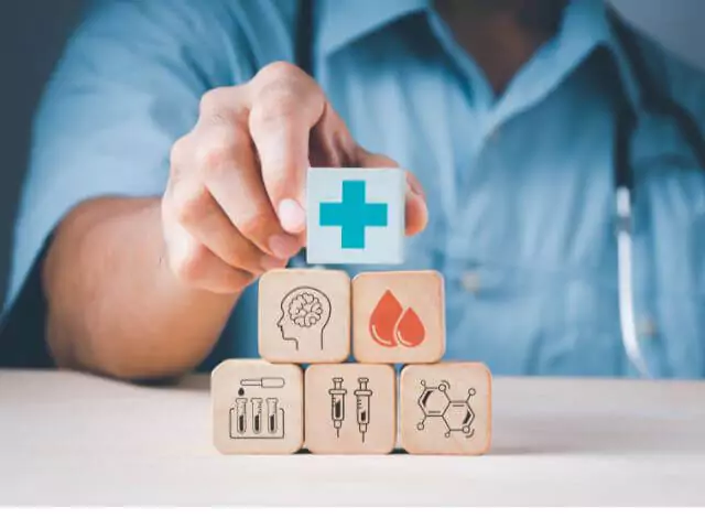 nurse using building blocks showing medical icons