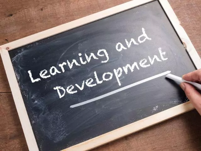 learning and development written on chalkboard