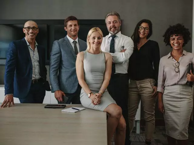 group of professionals posing for the camera