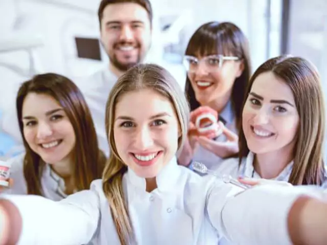 dental staff taking picture