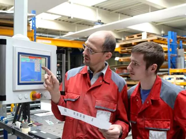 apprentice being taught engineering