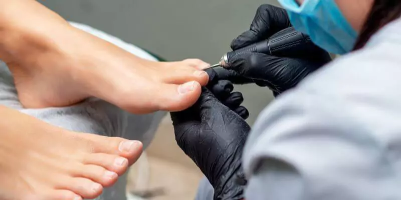 woman getting pedicure