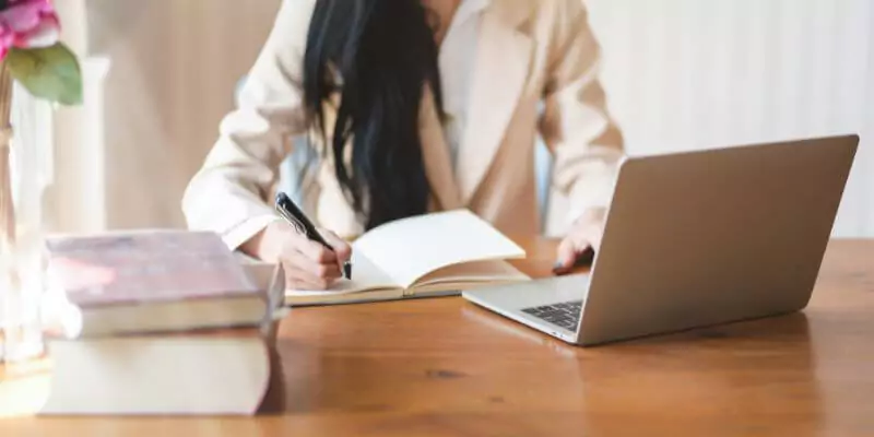 woman studying a course online