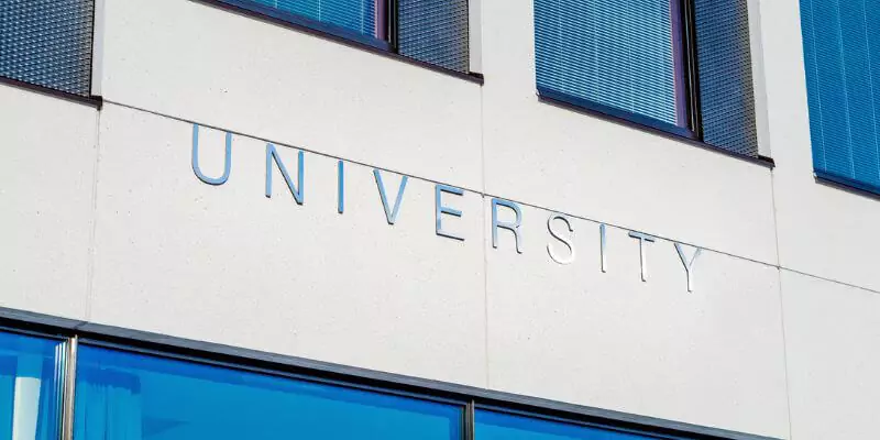 university sign on building