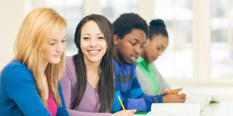 four students studying