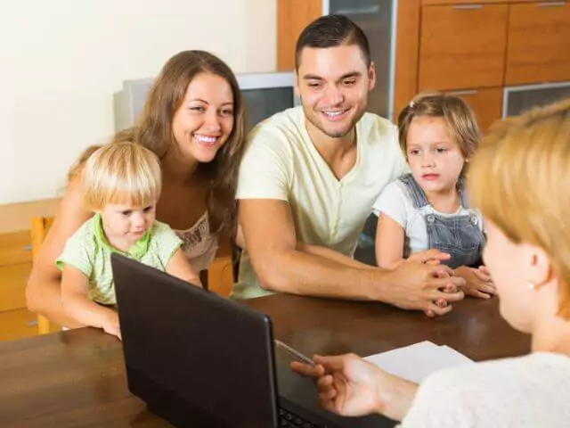 social worker talking to family