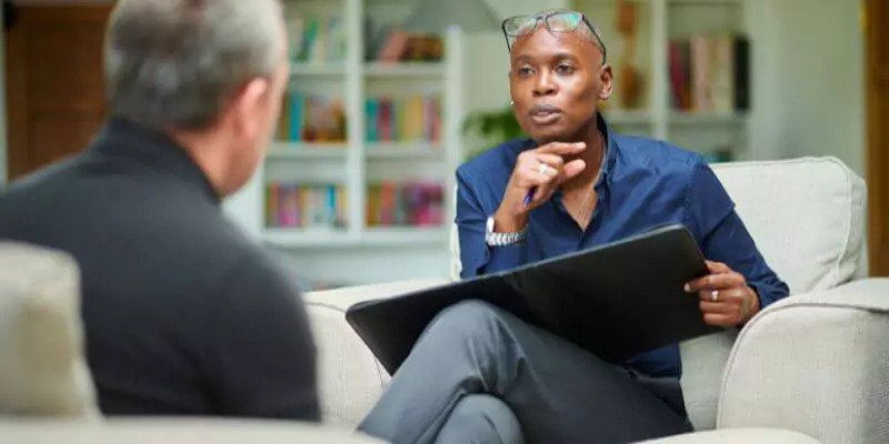 counsellor talking to patient