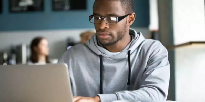 man working on laptop