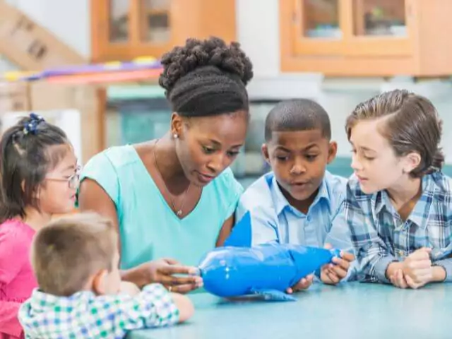 science teacher building rocket with bottle