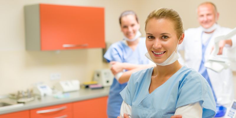 How Much Does A Dental Nurse Earn? (dental-nurse-smiling-at-camera.jpg)