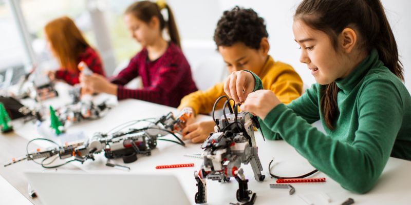 Coventry Schools Get Funding For Futuristic Learning (four-kids-building-robots.jpg)